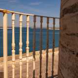 ...raggiungiamo il balconcino circolare esterno